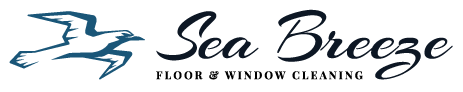 Sea Breeze Logo featuring an outline of a bird in flight on the left, with the text "Sea Breeze" written in cursive to the right, evoking a sense of freshness akin to a pristine window cleaning. Floor And Window Cleaning